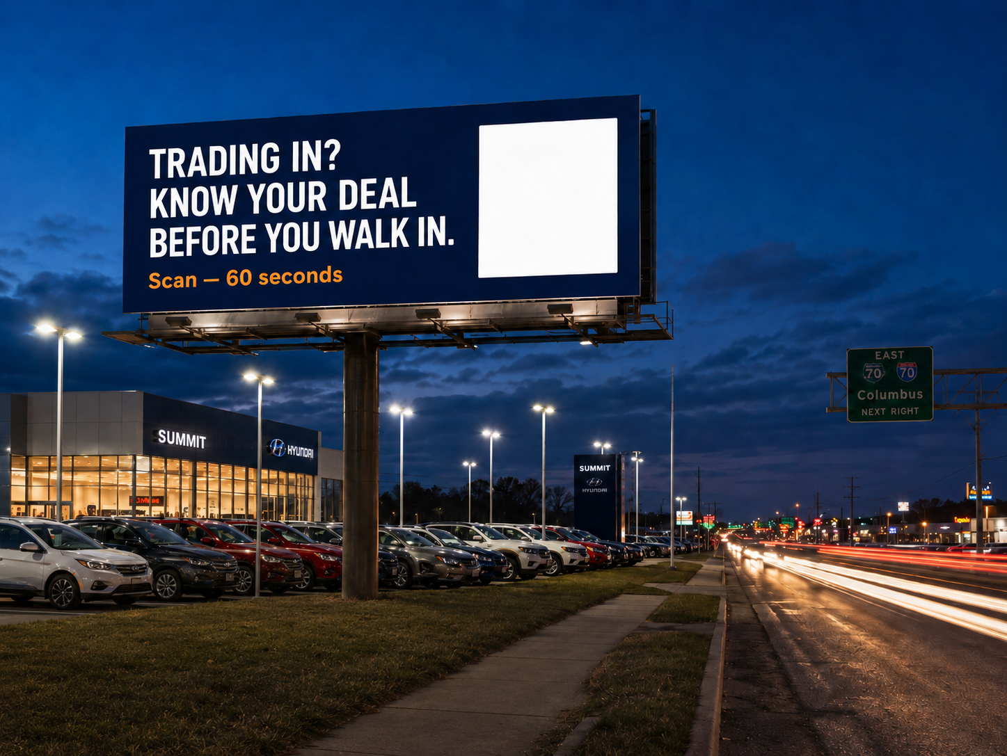 Dealership billboard at dusk over a car lot beside the highway, reading: Trading in? Know your deal before you walk in. Scan — 60 seconds.